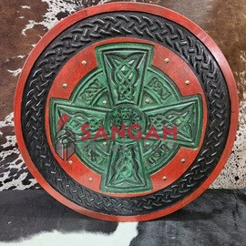 Round shield with Celtic cross motif