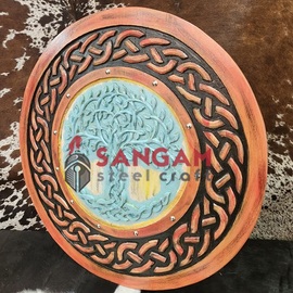 Viking shield with carved old Norse tree of life symbol